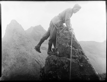 Male rock climber thought to be Cuillin mountains, Skye, Scotland, UK c 1900-1920