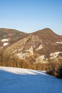 Cervenokamenské cliff (cervenokamenske bradlo), a huge rock at a mountain with bushes, trees and