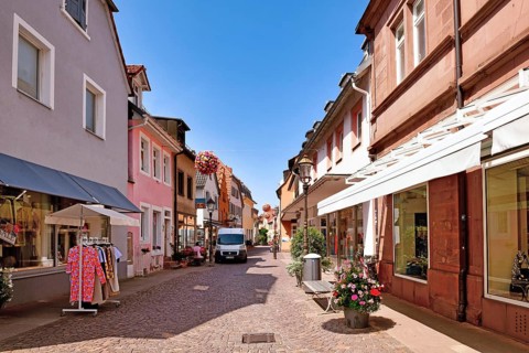 Ettlingen, Germany - August 13th 2025: City street in Ettlingen city center with boutiques and