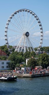 Large Ferris wheel on the waterfront promenade, Warnemünde, Rostock, Mecklenburg-Vorpommern,