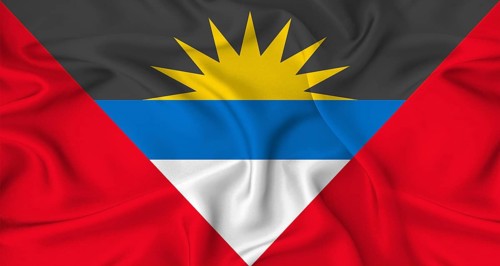 Realistic Antigua and Barbudan flag waving. Close up of flag of Antigua and Barbuda with cloth