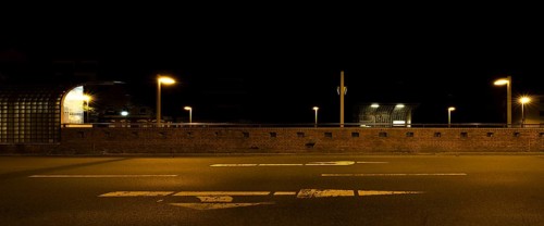 View across the street to the city railway station Stadtfriedhof Stöcken at night, Stöcken,