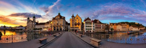 Panorama from the Reuss Bridge to Lucerne's Old Town with Jesuit Church at dawn, Canton of Lucerne,