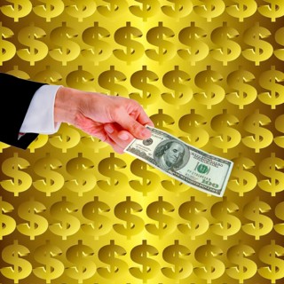 Symbolic image, hand holds out 100-dollar note in front of dollar wall, Wall Street and Dax