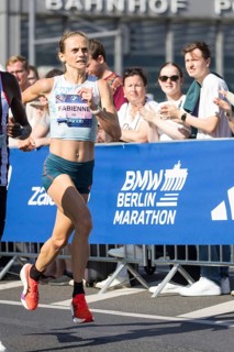 Fabienne Königstein (GER) later fastest German, at KM38 in front of Potsdamer Platz at the 51st BMW