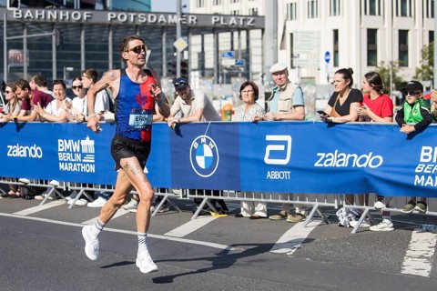 Erik Hille (GER), later in 21st place, at KM38 in front of Potsdamer Platz at the 51st BMW Berlin