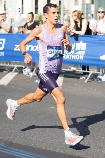 Hassan Chahdi (FRA), later in 6th place, at KM38 in front of Potsdamer Platz at the 51st BMW Berlin