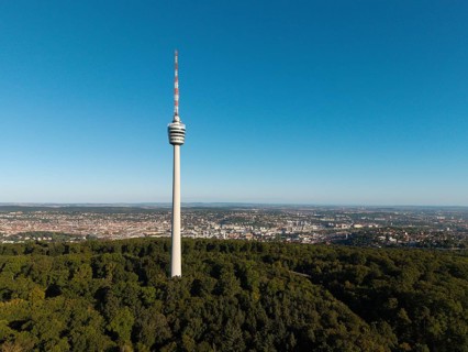 Television tower rises above a wooded area with an urban view, Stuttgart, Baden-Württemberg,