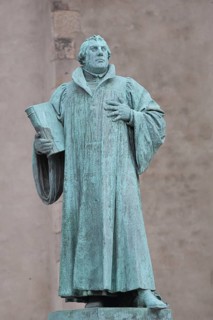 Luther monument, Martin Luther with Bible, sculpture, verdigris inscription, monument, Magdeburg,