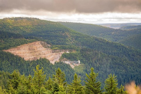 Quarry in the middle of forests under a cloudy sky, Black Forest, Seebach, Germany