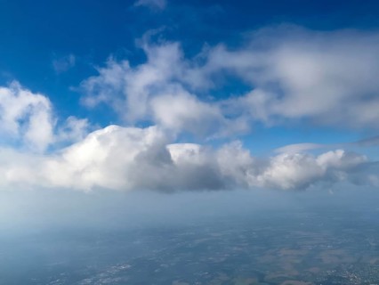 Aerial view of altocumulus clouds in the centre top centre cirrocumulus clouds cluster clouds, top
