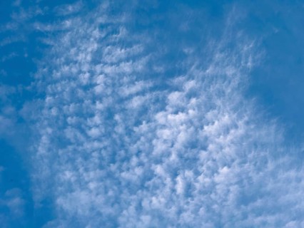 Large cloud field of cirrocumulus clouds high cumulus clouds, international