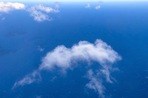 View from aeroplane of white bright cumulus clouds Cirrocumulus clouds Cirrocumulus at high