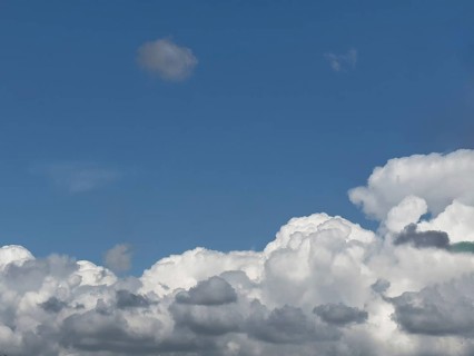 White cumulus clouds Cumulonimbus clouds Cumulonimbus clouds under blue sky, international