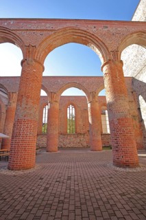 Interior view of the St Bartholomäi church ruins, view upwards, open, archways, columns, pillars,