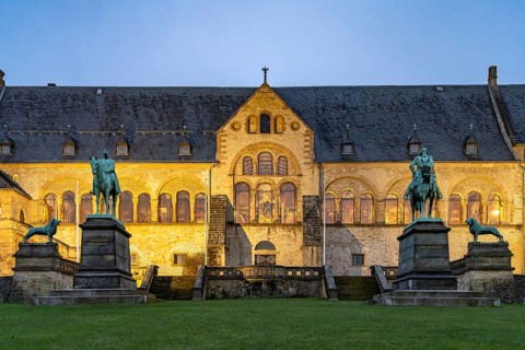 The Imperial House of the Romanesque Imperial Palace, UNESCO World Heritage Site in Goslar at dusk,