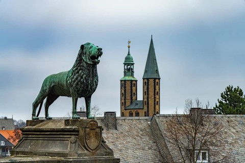 Brunswick Lion of the Imperial Palace and the towers of the Market Church of St Cosmas and Damian