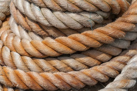 Close-up of several twisted ropes in shades of beige and brown with a clear texture, East Frisia,