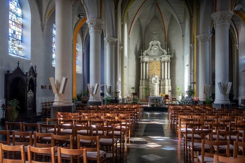 Altar of the 19th century Gothic Revival Saint Martin church in the village Beauraing, province of