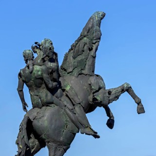 Bronze statue of the Ros Beiaard by sculptor Jan Desmarets, folkloristic horse in the city