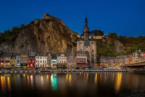 Citadel and 13th-century Collegiate Church of Notre Dame de Dinant in the city along the river