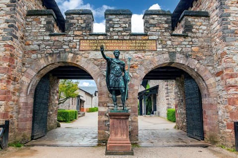 Statue of ancient Roman emperor Antoninus Pius with right arm raised to Roman salute Saluto romano