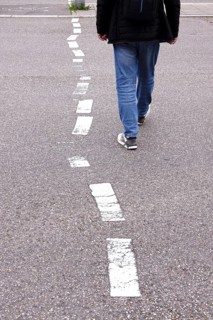Displaced road markings, symbolic image of need for renovation, Germany