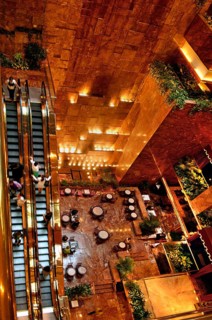 Café and escalators in Trump Tower, New York City, USA