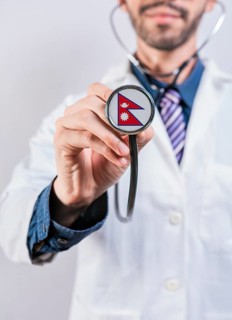 Nepal health and medical insurance concept. Nepal healthcare system, doctor holding stethoscope