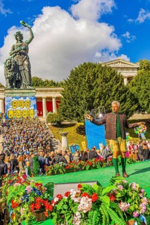 The Lord Mayor of the City of Munich conducts the musicians of the Wiesnwirte square concert under