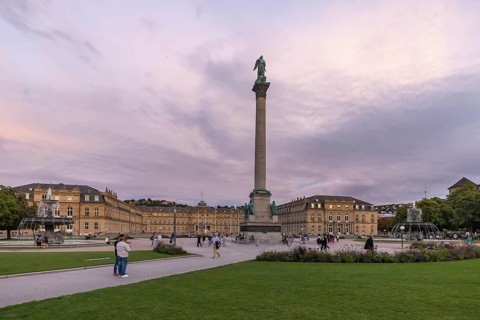 Evening atmosphere at Schlossplatz Stuttgart. View of the New Palace and Jubilee Column. Stuttgart,