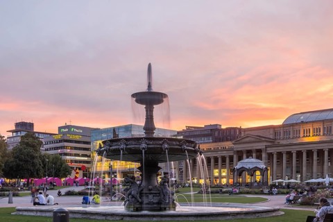 Evening atmosphere at Schlossplatz Stuttgart. View of Königstraße, art museum and Königsbau.
