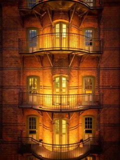 Hamburg warehouse district with evening lighting, Hamburg, Germany