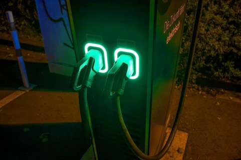 Evening-lit charging station for electric cars in a car park, Erlangen, Middle Franconia, Bavaria,