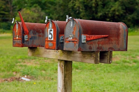 Rusted, private mailboxes at the front of the street, Walpack, New Jersey, USA