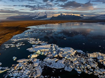 Ice floes, glacier, glacier tongue, fog, clouds, morning mood, mountains, reflection, aerial view,