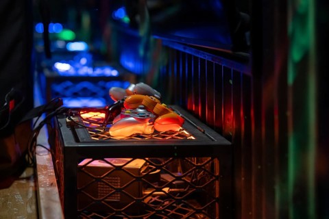 Orange-coloured gaming controllers, futuristic and tech-savvy atmosphere, arcade, Soho, London,
