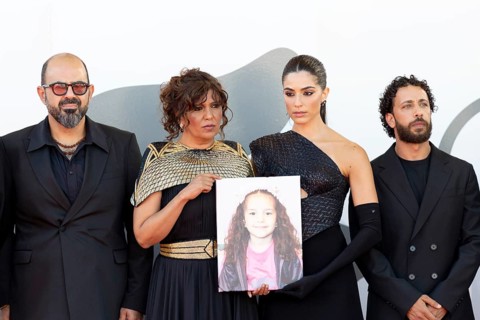 Venice, Italy - 3 September 2025: Kaouther Ben Hania and Saja Kilani with a portrait of