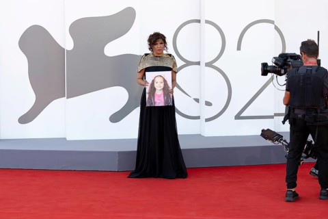 Venice, Italy - 3 September 2025: Kaouther Ben Hania with a portrait of five-year-old Palestinian