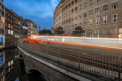Long exposure at Mönkedamm with underground line U3 and light strip and St Michael's Church in the