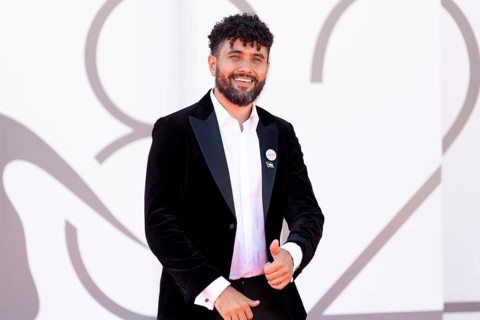 Venice, Italy - 3 September 2025: Amine Bouhafa wears a sticker in the colours of the Palestine