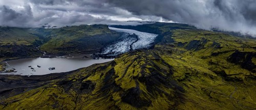Glacier, glacier tongue, lake, mountains, cloudy, rainy, summer, panorama, aerial view,