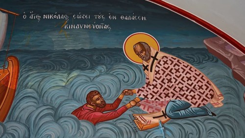 Orthodox wall painting of a rescue in the water by a saint, Chapel of Agios Nikolaos, harbour,