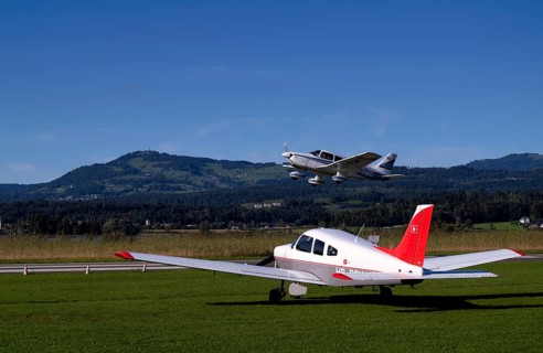 PA28 Archer II 180 HP identification aircraft registration HB-PMG during take-off over Piper Archer