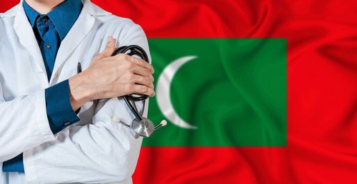 Doctor with stethoscope on Maldives flag. Doctor holding stethoscope on Maldives flag