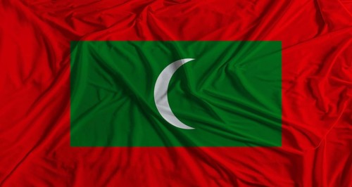 Maldivian flag with fabric texture background. National flag of Maldives with cloth texture