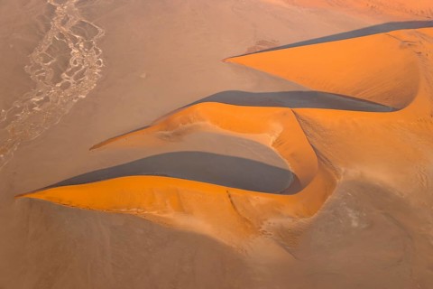 Sand dunes in the Namib Desert. In the evening. Aerial view. Namib-Naukluft Park, Namibia