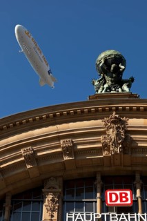 Main front of the main railway station with Atlas carrying the globe on his shoulders and a