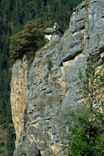 The small Chapelles des Pontis chapel on a rocky outcrop on the precipice, Chandolin, Val
