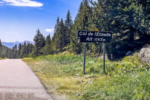 Sign at the top of the Col de l'Echelle Echelle Alpine pass with altitude indication 1762 m metres,
